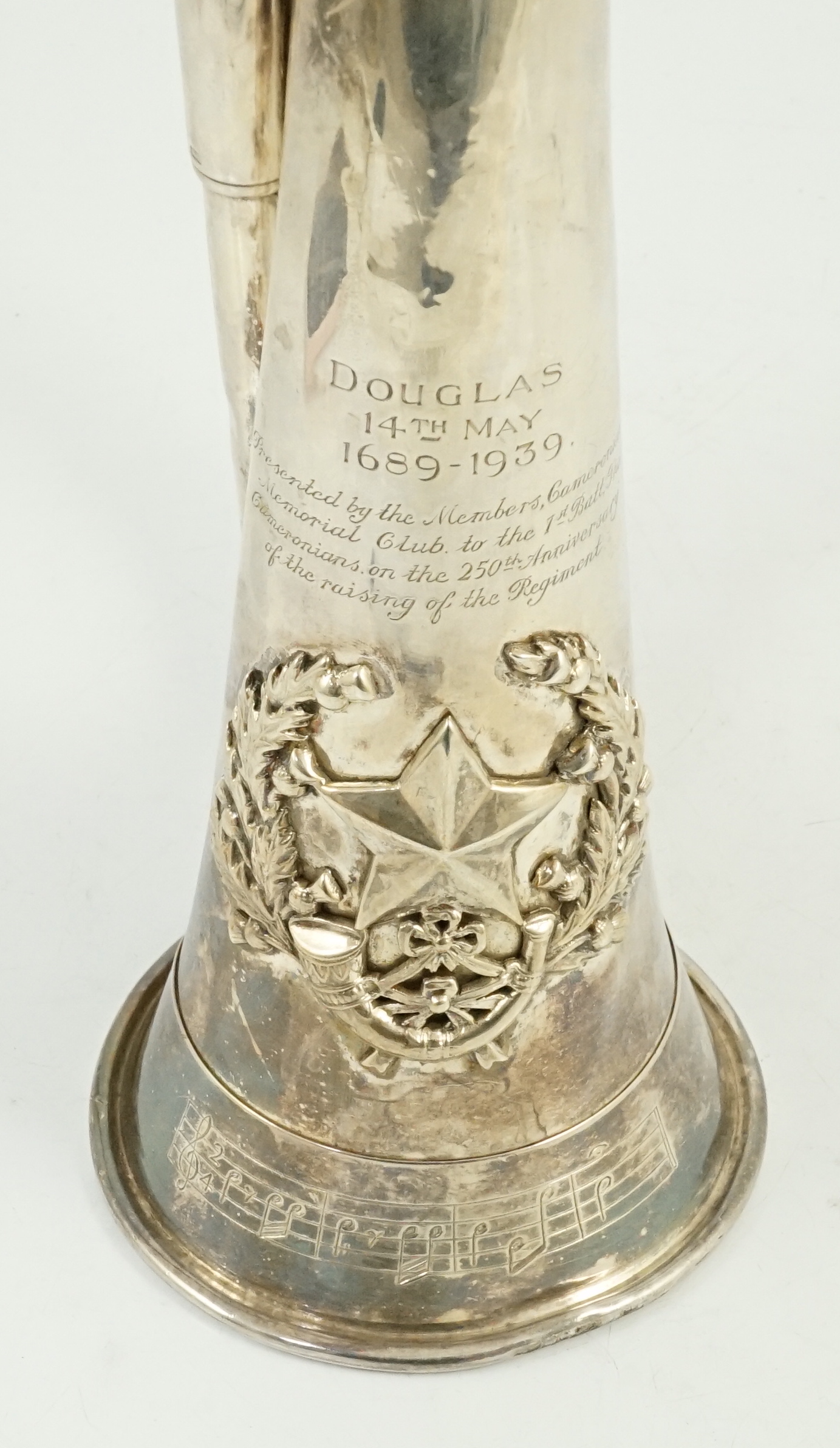 The Cameronians (Scottish Rifles). A George V silver presentation bugle, H.Potter & Co., London, 1938